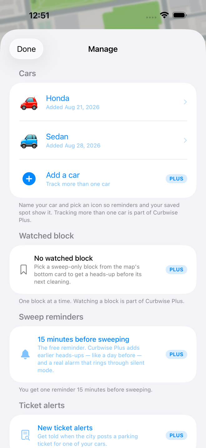 The Manage screen listing two cars, the watched block, and sweep reminders, with each paid row tagged by a PLUS badge.